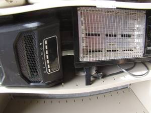 lot 90 image: lifesmart heater busted on one side, instant heat thermostat heater