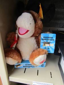 lot 96 image: 2 graduation cap photo frames holds 4 pictures, graduation plush dog that sings