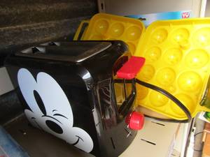lot 99 image: mickey mouse toaster, 2 egg holders new, always fresh seal vac new in box,