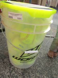 lot 111 image: tub full of ncaa softballs new