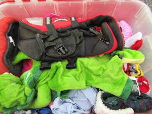 lot 141 image: tote full of various dog costumes and clothes, sizes small and medium