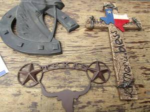 lot 30 image: 13 12 tall America bless cross, black hanging house with horse shoe, metal Texas longhorns hanging sign