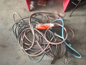 lot 148 image: 2 air hoses with a air pumping gauge