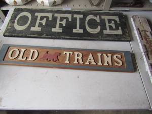 lot 179 image: wooden office sign 11x34, old trains wooden sign 6x32, fence pot wooden art with cowboy boot that says Texas 24x5