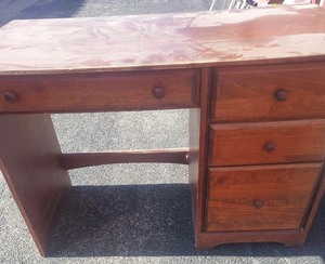 lot 4 image: Wooden desk has 4 drawers 30 X 45 X 24