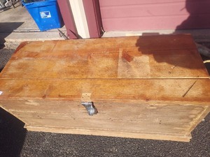 lot 11 image: wooden trunk has wicker handles, has a tray  - top is locked but opens up as part is disconected  18x38x16