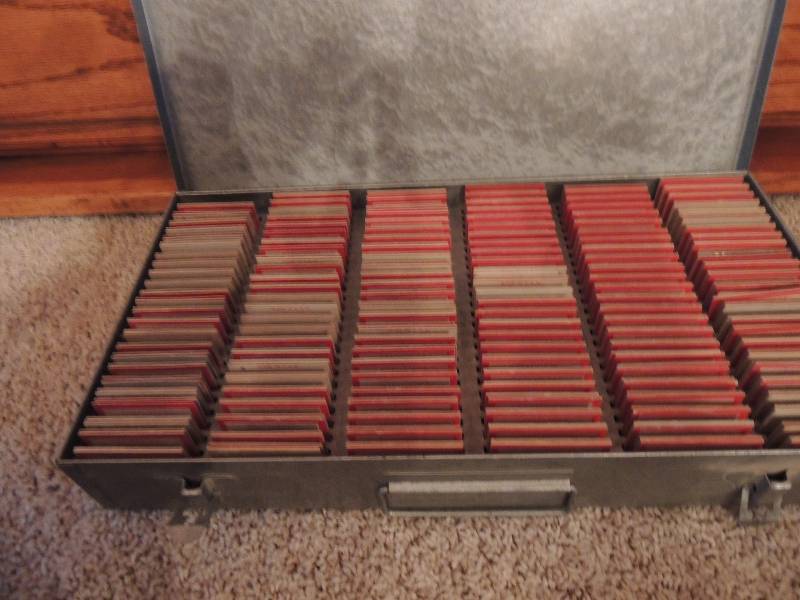 lot 141 image: Metal Box with 100 slides...