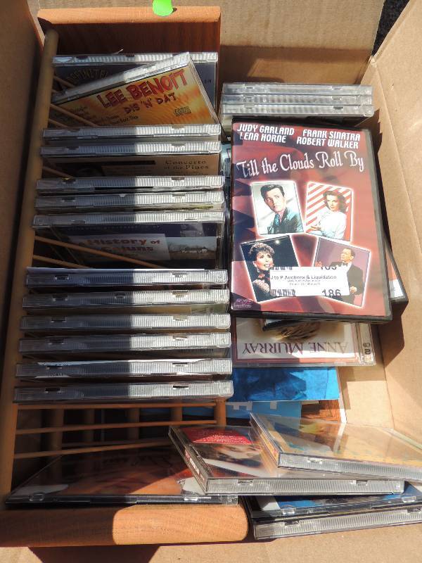 lot 186 image: Misc. CD, DVDs, and CD Holder...