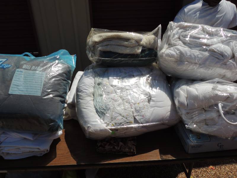 lot 216 image: Bed Pillows and comforters...