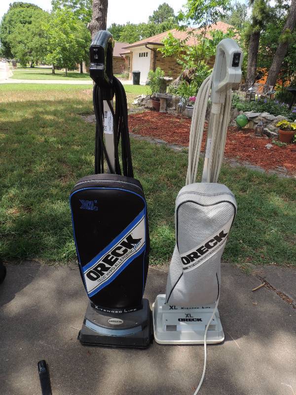 lot 312 image: 2 Oreck vacuum cleaners...