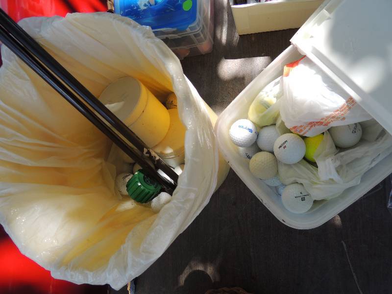 lot 448 image: golf balls and golf teas...
