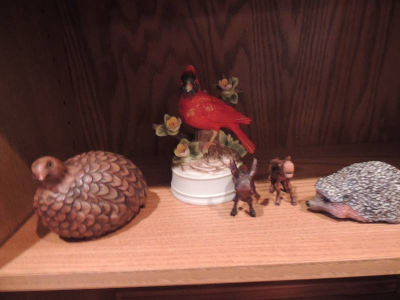 lot 126 image: Hedge hogs, wooden donkeys, music b...