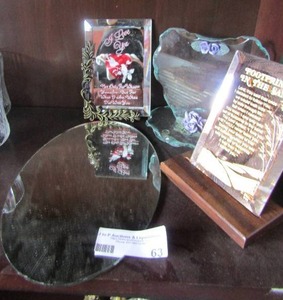 lot 63 image: home dcor lot includes small oval mirror, I love you saying on a mirror, 50th anniversary poem on a clear glass heart with purple flowers, and a footprints in the sand saying