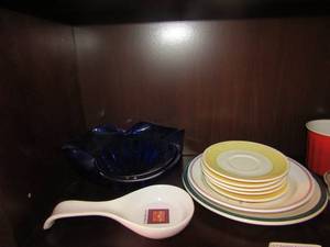 lot 89 image: Dinner plates and saucers, spoon rest, red handled cup, pink bowl, Purple bowl