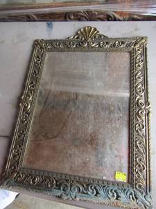 lot 94 image: 2215 12 Metal framed wall mirror great condition needs cleaned