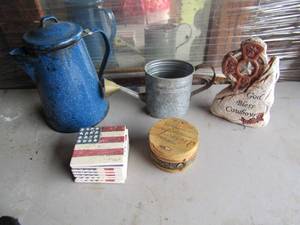 lot 97 image: Blue speckled water can, God Bless cowboys sign, Texas coasters qty 7, trinket