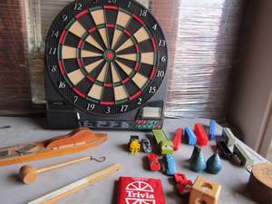 lot 112 image: Electronic dart board, various vintage kids toys, trucks, train cars and more