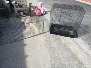 lot 27 image: small black metal yard fence, large black bird cage