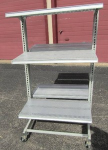 lot 33 image: white doubled sided rolling cart 3 tier 60x33x30