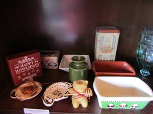 lot 80 image: Home dcor lot includes,2 butter dishes, honey bear canlde, 2 tin cans, and more
