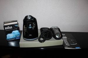 lot 2 image: Braun Series 7 Clean and Renew Electric Razor System