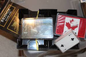 lot 37 image: Variety of Decks of Playing Cards, including Canada and a Holder for Bridge