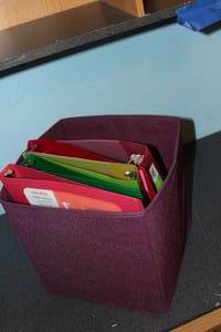 lot 67 image: Softback Binders and Cloth Storage Box