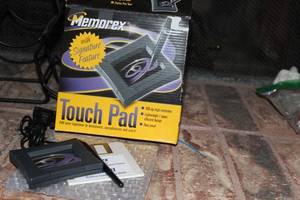 lot 15 image: Memorex Touch Pad Signature Dock