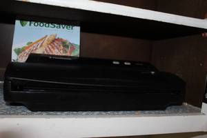 lot 9 image: FoodSaver Food Storage Machine