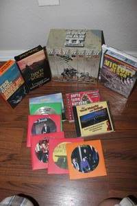 lot 128 image: DVDs CDs and VHS as shown