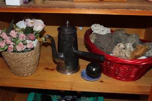 lot 141 image: Home decor Items. including silver Plated pitcher  and a variety of unique rocks,  some fossils, crystals petrified and more.. please see photos