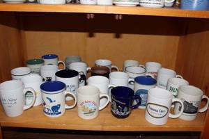 lot 159 image: A collection of location themed coffee mugs
