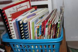 lot 168 image: A basket full of vintage cookbooks
