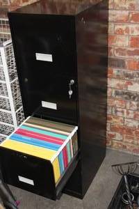 lot 189 image: Four Drawer Filling Cabinet with one drawer full of file folders