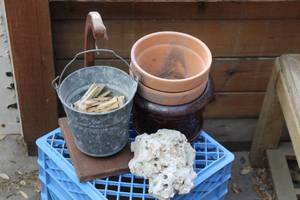 lot 204 image: Variety of planters and fossil Rock