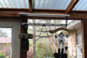 lot 203 image: Wooden Shelf with hooks and Outdoors Deco