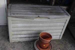 lot 212 image: Outdoor storage chest and planters approximately 46x24x18