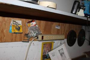 lot 253 image: All Contents Hanging under shelf, Considerable Quantity of L Brackets in Different Sizes, Circular Saw Blades and Chop Saw Blades and More