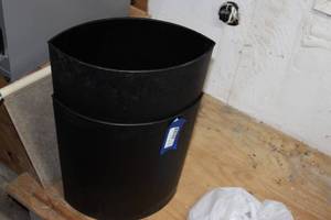 lot 254 image: Small Black Trash Cans (2)