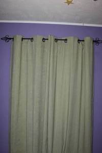 lot 282 image: Light Green Curtains and Curtain Rod 2 Curtain Panels Approximatley 24x80