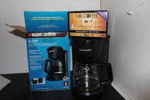 lot 316 image: Black and Decker 5 Cup Coffee pot and a Replacement Mr. Coffee 4 cup Pot