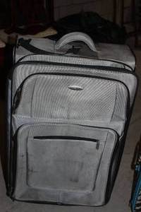 lot 335 image: Large Rollin suitcase