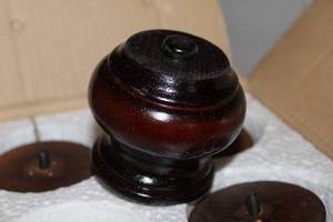 lot 264 image: Four Replacement Feet for a Couch or Chair
