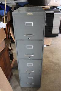 lot 86 image: Four Drawer Metal File Cabinet