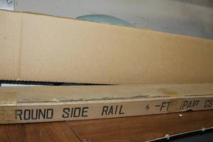 lot 19 image: Unopened Box... Round Side Rails for pick-up 6 Ft Long