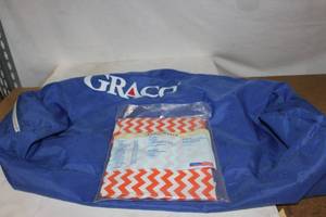 lot 64 image: Portable Toddler Pack-n-Play Cover and Portable toddler bed fitted Sheet