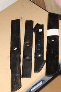 lot 153 image: Generous Quantity of Lawnmower Blades in Varying types, lengths, and Styles... See Photos