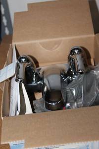 lot 181 image: Unused Moen Bathroom Touch Control Faucet... SIB