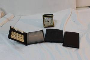lot 45 image: Mens Leather Wallets (3) and travel alarm clock