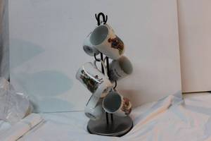 lot 47 image: Set of 6 Vintage Norman Rockwall Collectors Coffee Cups with Display Stand